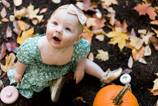 How To Get Perfect Pictures of Your Baby In a Pumpkin Patch