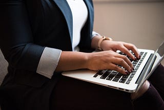 Powerful female attorney working on a laptop