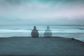 A man sitting on the sea shore. Nobles. Lost Wisdom Of Solitude.