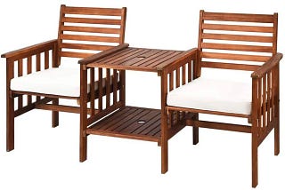 Stylish Acacia Wood Outdoor Loveseat with Table and White Cushions | Image