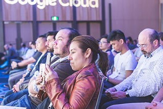 Erika Bell front row at Sydney’s first Google Cloud Summit, capturing Australia’s first GCP partner on stage with NewsCorp and Monash University. Photo credit: Ryan Farrow.