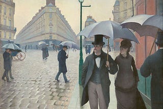 A painting of late 19th century Parisians walking along a street carrying umbrellas.