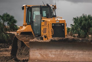 Yellow bulldozer at work