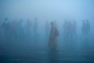 People walking in smog