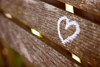 love heart painted on fence