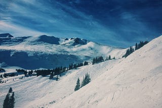 Beautiful snowy mountain ski slope
