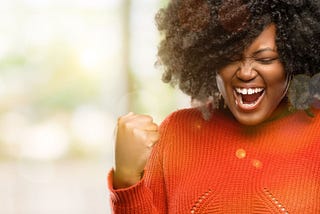 Black women is excited about something