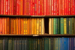 Books stacked on shelves