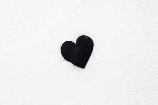 Black heart on a white background.