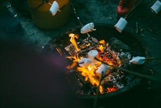 a campfire scene at summer camp