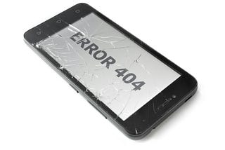 Close up of damaged cell smartphone with lettering "Error 404"