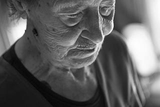 black and white face of an old woman
