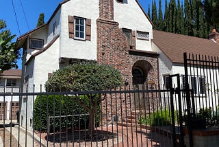 Bobcats and Camellias and Two Great Houses