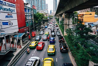 Cars fill a four lane street