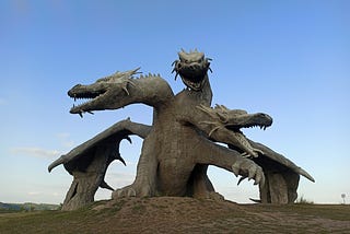 image of a statue of a three-headed dragon