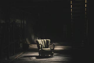 Solitary chair in an abandoned house