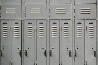 A lot of gray lockers.