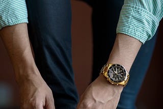 Man wearing Rolex watch