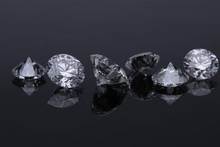 A row of differently-sized diamonds.