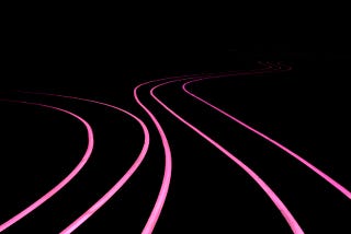 Neon pink swirls against a jet black background.