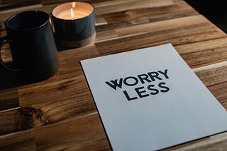 book on table about worrying less