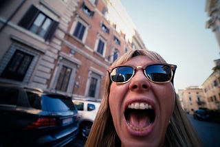 woman on the street being loud and wild
