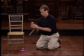 Will Ferrell being a cat playing with cat toys