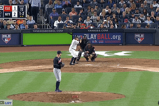 Cleveland Indians pitcher Corey Kluber strikes New York Yankees left fielder Brett Gardner out looking at Yankee Stadium.