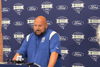 Gif of New York Giants head coach Brian Daboll at the podium
