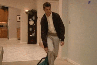 Gif of man falling over onto a carpet