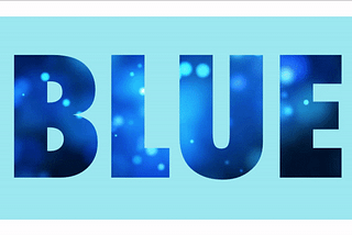 The word blue with a video of particles playing in the background.