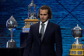 Gif of Rangers goaltender Igor Shesterkin accepting the Vezina Trophy at the NHL awards