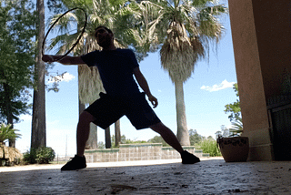 A GIF of the author doing a trick with a hula hoop, the shoulder roll.
