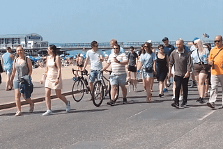 Chandy and Gordon walking on Bournemouth promenade