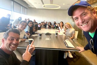 Known Studios presidents Mark Feldstein and Brad Roth pose with USC Annenberg students during a visit to Known’s Los Angeles office.