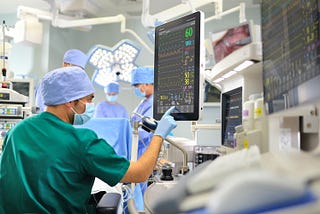 Doctor with ventilator.