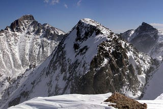 Snow-covered granite peaks.