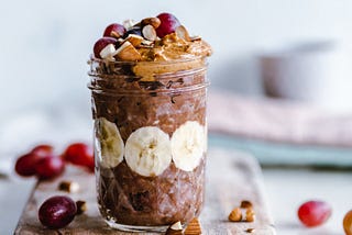 Glass jar filled with fruit, nuts, etc.