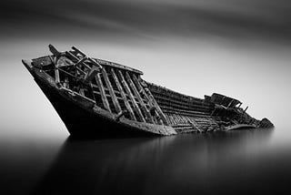 black-and-white photo of a sinking ship