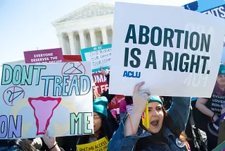 Pro-choice activists protest during outside the US Supreme Court on March 4, 2020.