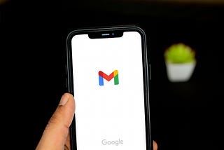 Mobile phone displaying Gmail app loading page