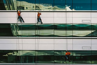 The Window Washer and I Lead Parallel Lives