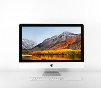 iMac on a white table
