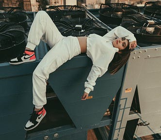 Calm woman lying on air conditioner system