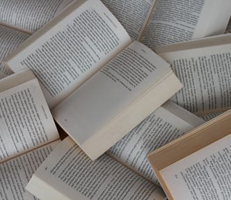 The image is full of open books, waiting to be read