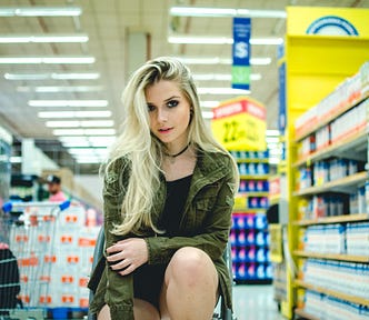 A teenage girl who looks troublesome in a super market.