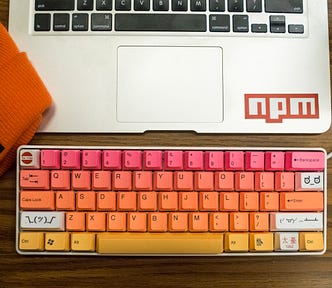 A laptop with Npm logo.