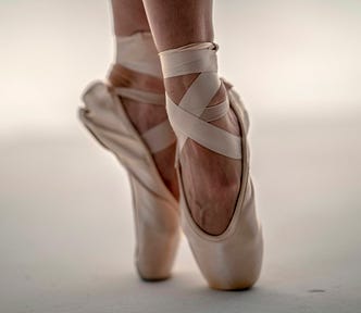 ballerina on pointe in toe shoes