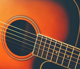 Orange Acoustic Guitar