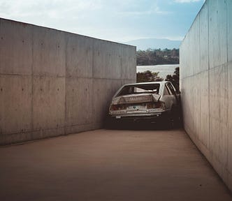 Car stuck between two walls